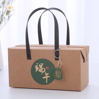 China 2021 New Design Creative Luxury Recyclable Kraft Paper Gift Boxes Custom Printing Logo Paper Box With Handle for sale