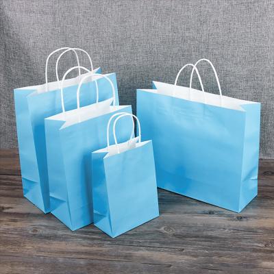 China Recyclable Wholesale Custom Printed Custom Retail Shopping Tote Paper Bags With Handle Blue Craft Kraft Paper for sale