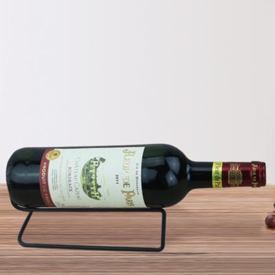 China Sustainable Household Black Iron Wine Bottle Rack Tabletop Single Wine Bottle Holder Wine Display Stand for sale