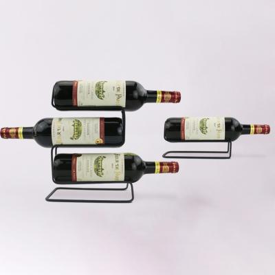 China Sustainable Hot Sale Single Three Wine Bottle Holder Free Standing Metal Wine Rack With Hollow Open-topped Tank for sale