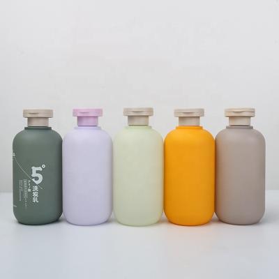 China Cosmetic Custom Color 200ml 300ml Matte 500ml HDPE Squeeze Shampoo Conditioner Bottle With Plush Cover for sale