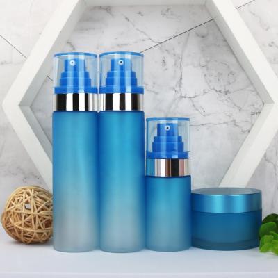 China Custom Blue Comet Spray Lotion 50g Jars 50ml 80ml 100ml 120ml Skincare Gradient Household Products Color Packing Bottle Set With Cream Pump for sale