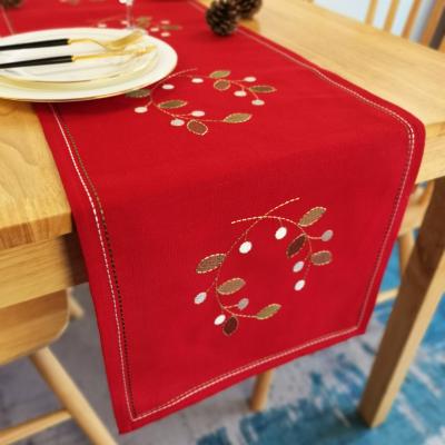 China Modern Embroidery Polyester Fabric Chenille Embroidered Red Table Runner With Tassels for sale