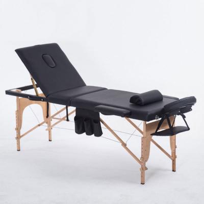 China 3 Section Modern Environmentally Friendly Foldable Sponge Filling Household Solid Wood Moxibustion Massage Table Tattoo Bed for sale