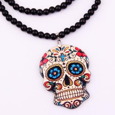 China High Quality Acrylic Skull Head Glass Bead Necklace Acrylic Black Day Of The Dead Big Jewelry Black Skull Pendant Necklaces for sale