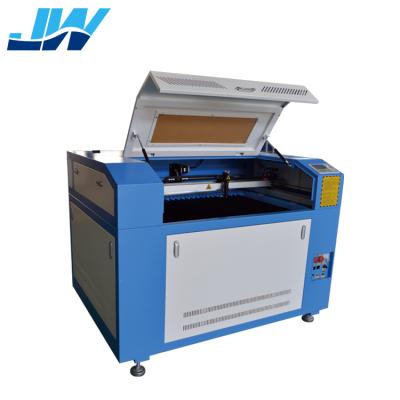 China Hot sale Jingwei 6090 rdc 6090 laser cutter and acrylic engraving machine price laser engraving machine price for sale