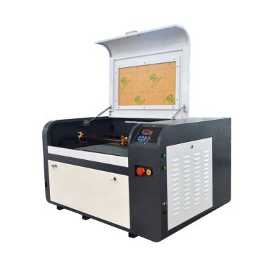 China Laser Engraving 50 Watt 4060 Laser Engraving Machine For Wood Paper Fabric for sale