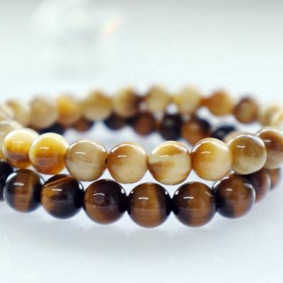 China CLASSIC Men's Tiger Eye aa class round stone bead feng shui gold charms and crystal love friendship couples handmade bracelets for sale