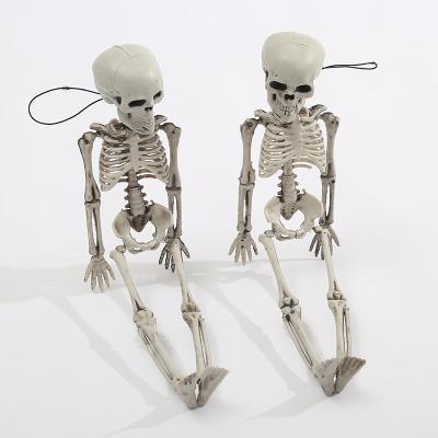 China Halloween 30cm Scary Simulation Human Body Skeleton Plastic Skeleton Room Haunted House Props Human Skeleton Decoration for sale