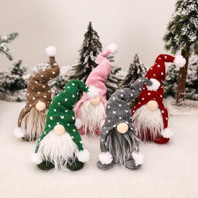 China 2021 CLOTH Christmas Decoration Items No Face Doll Forest Clause Beard Knitted Hat Doll Sitting Supply Items for sale