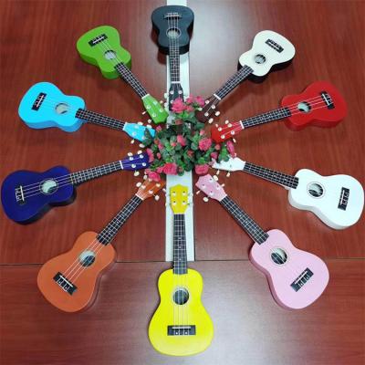 China 21 Inch Custom Cheap Carbon Fiber Ukulele Kids Series Colorful Ukulele For Beginners for sale