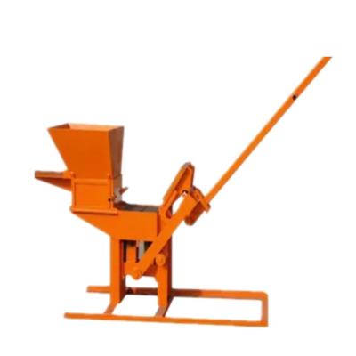 China Cheap price manual interlocking brick soil clay hollow block making machine for sale