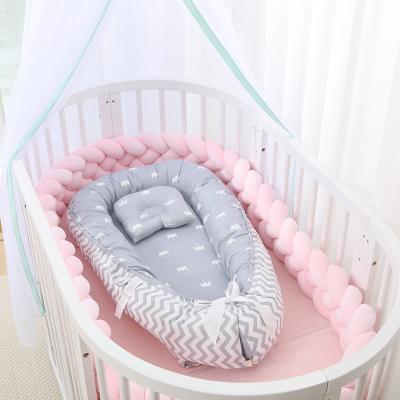 China Modern Hot Selling Reversible Velvet Baby Nest Portable Hutch Tra Toy Bar Toddler Bed Bassinet for sale