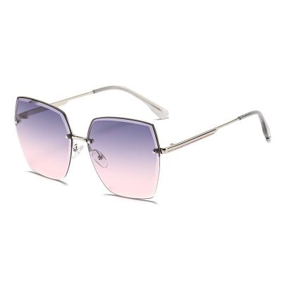 China 2022 New Women's UV Protection Sunscreen Rimless Sunglasses Women's Seaside Box Sunglasses for sale