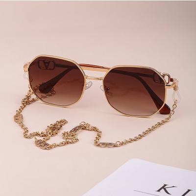 China Fashion sunglasses 2022 new trend UV400 glass ladies with anti-fall polygon chain sunglasses for sale