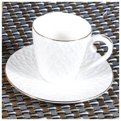 China Custom factory price 90ml bone china sustainable ceramic cup and saucer custom logo with gold rim embossed 1pcs for sale