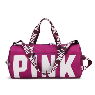 China Pink Gym Women Logo Large Capacity Customized Water Resistant Duffel Bags Waterproof Sports Travel Bag for sale