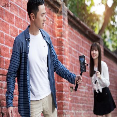 China 2021 Newest Selfie Stick 360 Rotate Face Camera Tracking Object Smart Shooting Mobile Phone Adjustable Smart Portable Auto Tripod Stand for sale