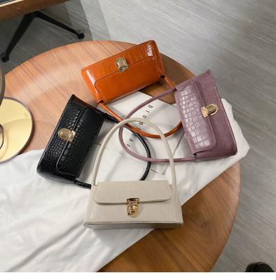 China 2021 vintage mini all-match PU pattern fashion shoulder bag pure color stone stone leather wholesale ladies handbag for sale