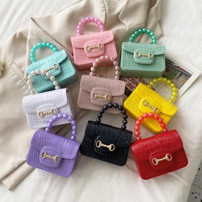 China 2021 New Crocodile Pattern Ladies Mini Jelly Bag PVC Shoulder Pearl Messenger Bag PORTABLE Mini Bag for sale