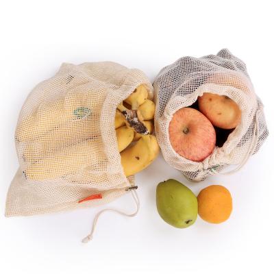 China Eco-friendly Amazon Fruit Vegetable Storage Mesh Onion Bags Cotton Mesh Eco-Friendly Drawstring Bag for sale