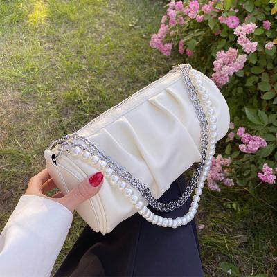 China 2022 fashion women's waterproof joker design cylinder handbag clips pearl chain popular shoulder bag for sale