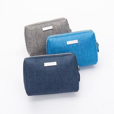 China 2022 Fashion Mini Cosmetic Storage Bag Washing Bag Cationic Hand Hot Selling Cosmetic Bag for sale