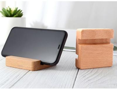 China Multi-Functional Made in China Solid Wood Cell Phone Stand Base Support Mobile Phone Stand Natural Wood Color MP4 Mobile Phone GPS PDA/ for sale