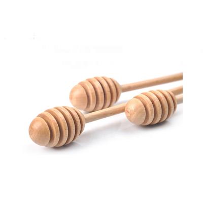 China Mini Wooden Honey Spoon Wood Made to Order Viable Honey Dipper Sticks for sale