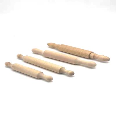 China Viable Mini Small Rolling Pins Kitchen Non-Stick Decorative Embossed Wood for sale