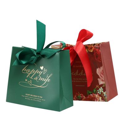 China 2019 Recyclable New Luxury Paper Gift Bag For Wedding Gift Packing With Customized Logo for sale