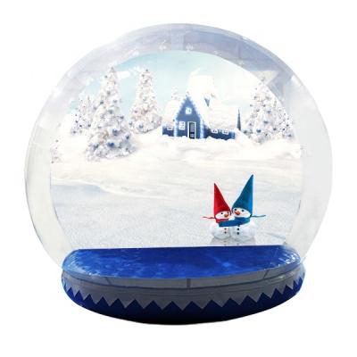 China Custom Life Size Outdoor Inflatable Snow Globe Decorations Inflatable Christmas Halloween Snow Globe for sale