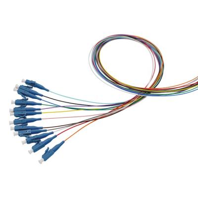 China FTTH FTTX LC SM UPC Fiber Pigtail Single Mode 0.9mm Fiber Optic Bundle Pigtail for sale