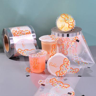 China Custom Logo Food Grade PP Paper Chime Bubble Boba Juice Drink Lid Moisture Proof Plastic Cup Printed Sealing Roll Film for sale