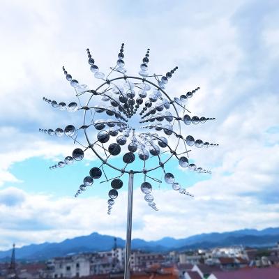 China Beautiful Guardian Statue Unique Windmill Garden Statue Metal and Magic Metal Windmill Outdoor Rotating Garden Decoration for sale