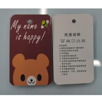 China Low MOQ Sustainable Logo Custom Embossed Paper Card Recycled Garment Tags Paper Hangtag for sale