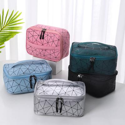 China 2022 New Lingge Series Multifunctional Portable Cosmetic Bag PU Geometry Wash Bag Waterproof Portable Storage Bag for sale