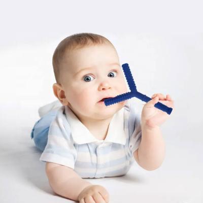 China Battery Powered Silicone Cavity Teether Tubes Y Shape Teething Tube For Infants With Nursing Biting Chewing Teether Straw for sale