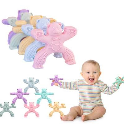 China Battery Operated Baby Silicone Building Block Toys Humanoid Stacking Educational Balance Game Teether for sale