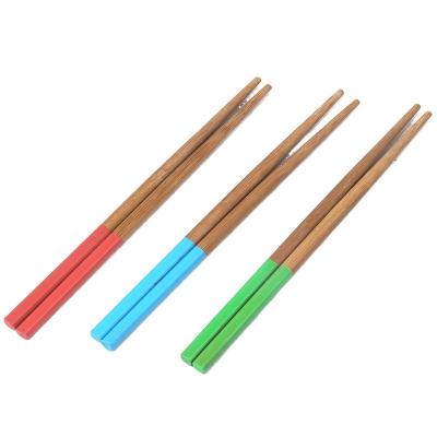 China Viable Wholesale Colored Bamboo Wooden Chopstick For Kids for sale