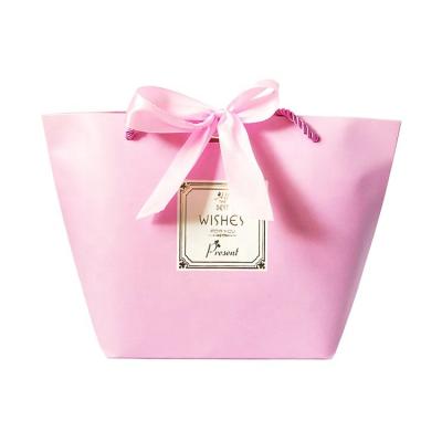 China PB-06 Recyclable Bow-knot Decoration Gold Foil Stamping Luxury Pink Fancy Paper Gift Bag Shopping Bags Gift Bags for sale