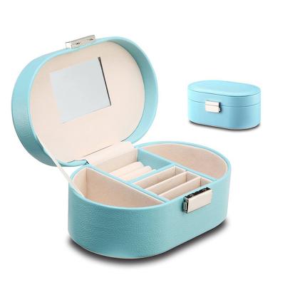 China Mini Travel Designer Velvet Folding Portable Leather Round Jewelry Box with Small Mirror and Mental Lock for sale