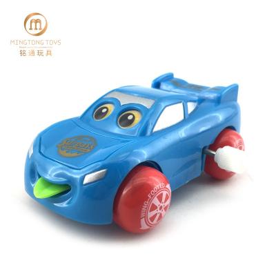 China Wind Toy Will Glow And Sticking Tongue Funny Cartoon Wind Up Car Toys For Kid for sale