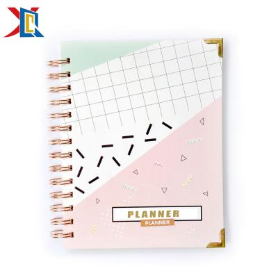 China Custom Thicker Paper Hardcover Book with Pen Holder 2020 Weekly Monthly School Planner Te koop