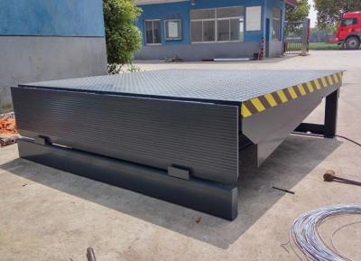 China Pit-style Container Loading Bay Equipment 6000KG Hydraulic Electric Dock Leveler for sale