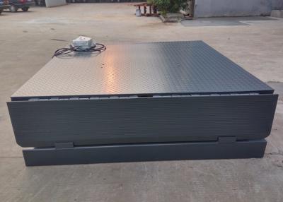 China nivelador de muelle hidráulico ajustado los 700MM del color gris de la altura de la capacidad 8000KG para la carretilla elevadora en venta