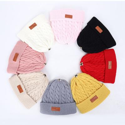 China Daily Life Wholesale Custom Design Fur Pom Poms Knitted Beanie Kids Winter Warm Hats For Kids for sale