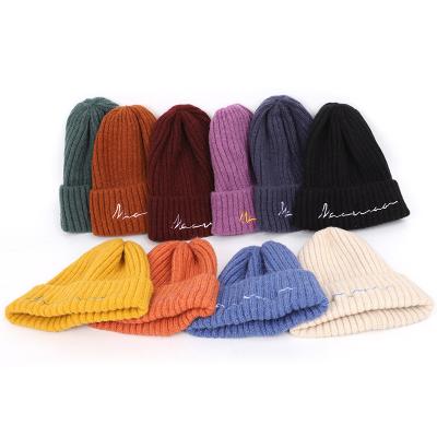 China Daily Life Candy Color Embroidery Kids Winter Hat Fashion Kids Knitted Beanie Hats 2020 for sale