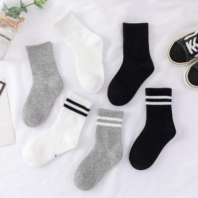 China High Quality RTS Solid Color Sports Kids School Socks Black White Novelty Basketball Sock Children Sports Socks for sale