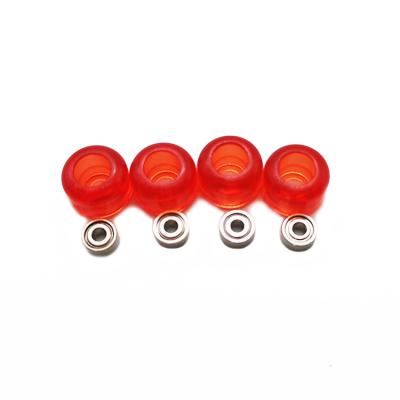 China Stable performance: voice red color transparent low bearing plastic wheel finger skateboard accessories wheels with supporting fingerboard wheel for sale